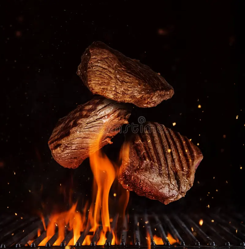 flying-pieces-beef-rump-steaks-black-flying-pieces-beef-rump-steaks-above-grill-flames-black-background-concept-117117742